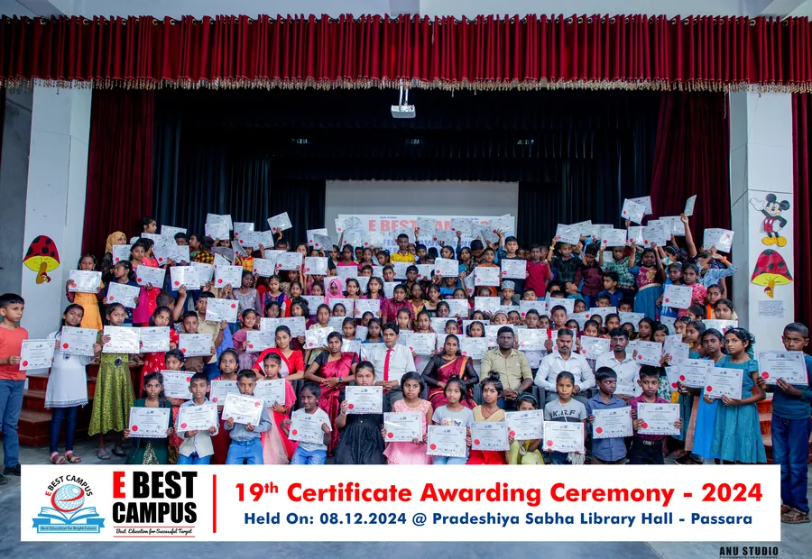 Students holding certificates at the 19th ceremony in Passara